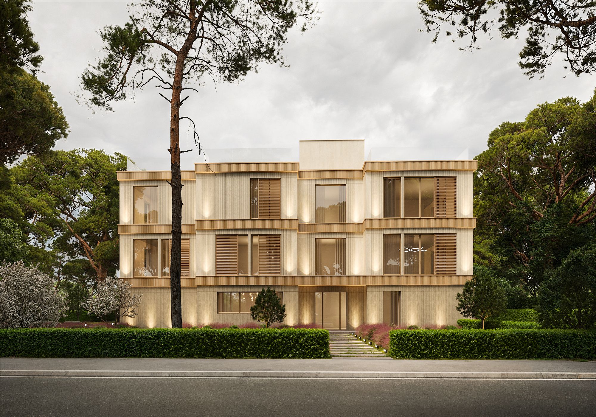 Vista exterior de la villa con volúmenes desplazados y forjados de madera entre los pinos