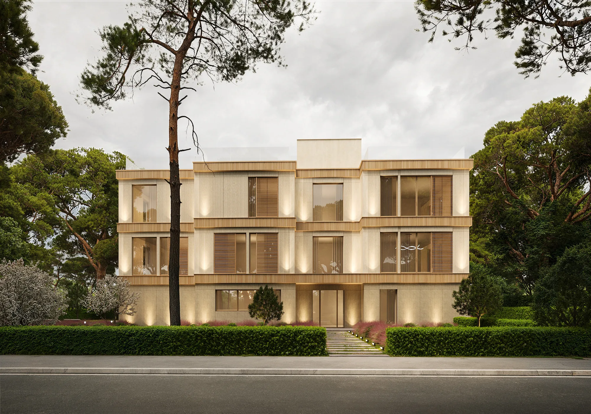 Vista exterior de la villa con volúmenes desplazados y forjados de madera entre los pinos