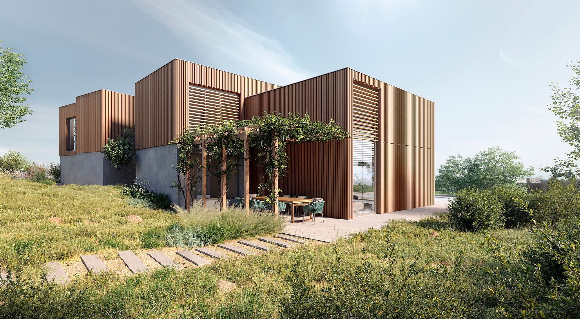 Rear façade with garden showing the play of volumes — a wooden slatted upper floor over a concrete base